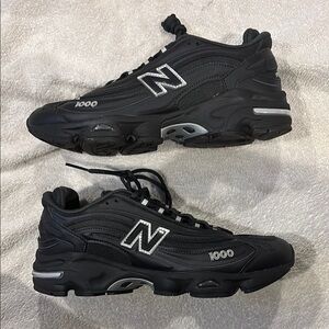 New Balance Black and Silver Sneakers